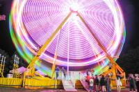 The Ferris Wheel spins away.