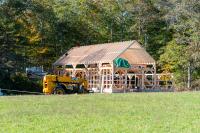 Roof rafters rise.