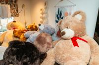 Piles of bears wait to be placed.