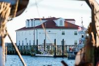Coast Guard Station Menemsha seen from across the harbor.