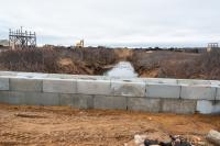 Wall now blocks the old Herring Creek.