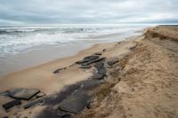 Old asphalt is revealed by new erosion at Right Fork.