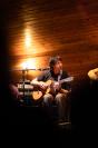 Isaac Taylor on acoustic guitar.