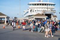 Locals and visitors alike stream off the ferry in Vineyard Haven.