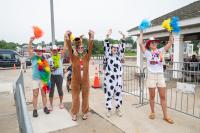 [l-r] Rachel Cortez, Kelly Tzannes, Mikayla Braver, Julia Neumeyer, Hilary Dreyer. wave to incoming campers on the boat.