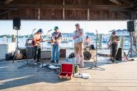 Dock Dance Band warms up before the crowd shows up.