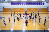 Dancers come together to form a star.