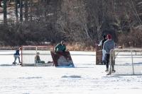 There is no Zamboni, but the rink still has to be cleared.