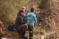 More experienced anglers help out the beginners.