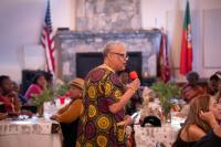Toni Kauffman speaks to the crowd at Taste of Juneteenth held at the PA Club.
