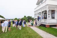 Guests move to the front lawn for dinner.