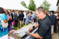 Guests enjoy the raw bar.