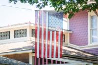 Old glory is flying around the Island today.