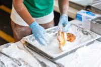 Having fun making the malasada fried dough.
