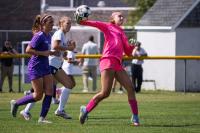 Vineyard goalie Delilah Oliver moves the ball forward.