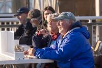The officials at the weigh-in table are there to help young anglers.