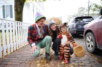 Ethan, Bri and daughter Rilo Buchanan-Valenti are getting in the spirit near the Old Whaling church.