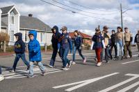 Young scouts parade as well.