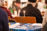 Guests at the Hebrew Center brought their family menorahs from home.