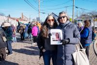 Batya Diamond and Lexi Ladd with a picture of Renee Good.